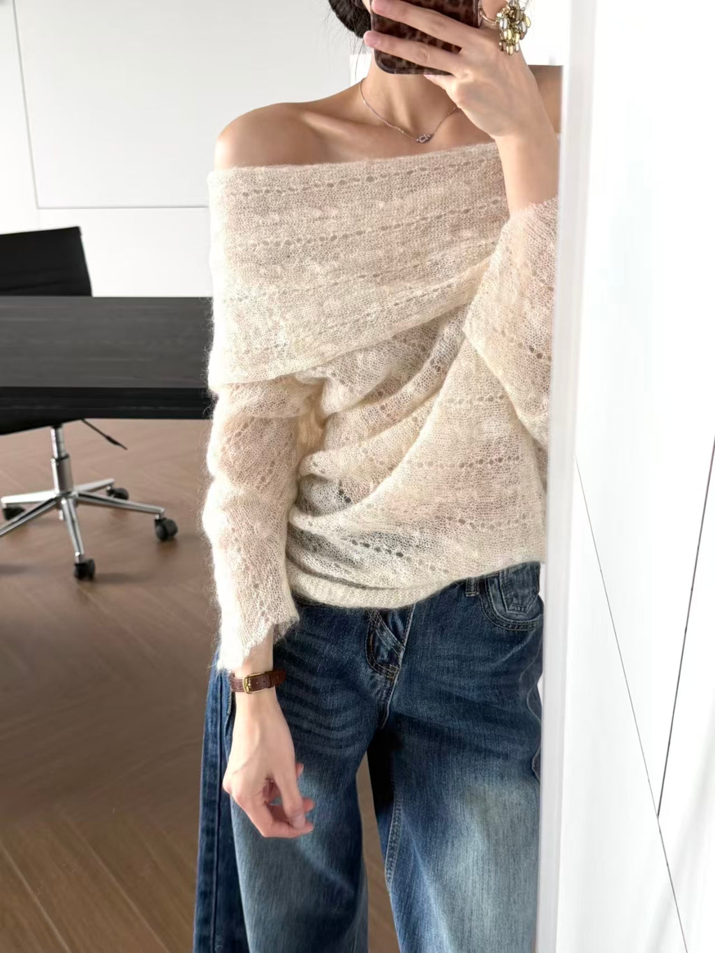 Off-shoulder hollow knit sweater - front view