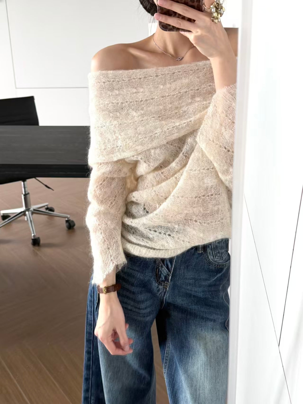 Off-shoulder hollow knit sweater - front view