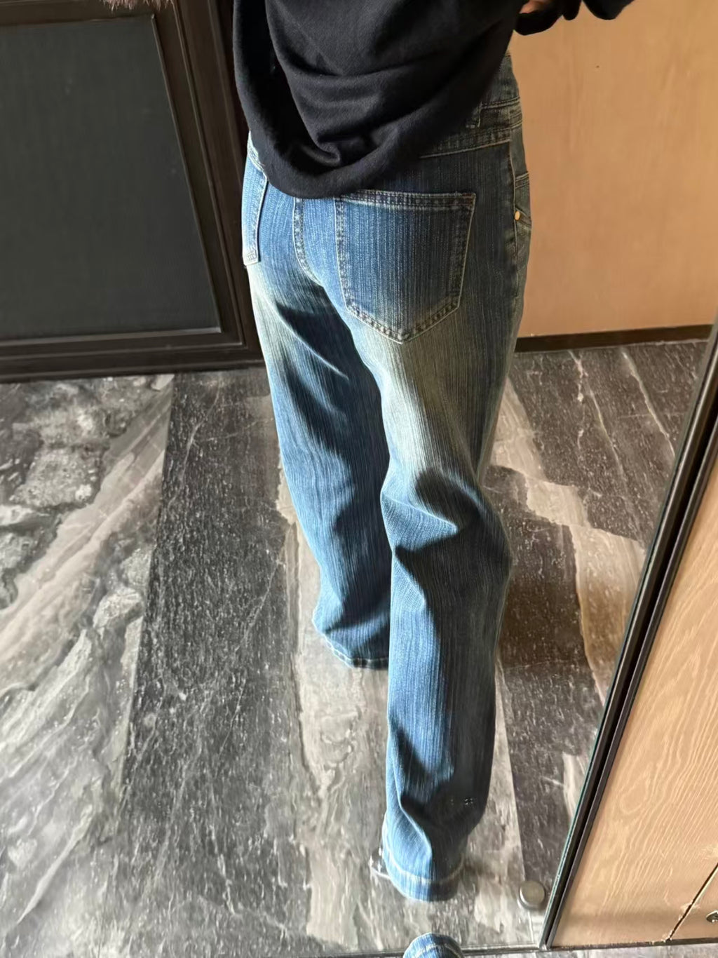 Low Rise Textured Flare Jeans - top down leg view