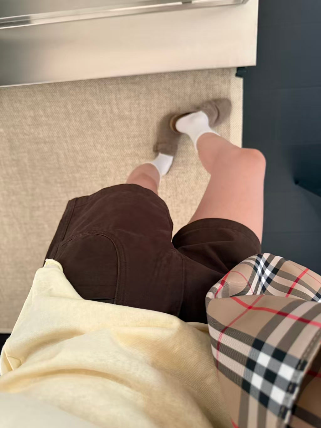 Side view of brown high-waist shorts