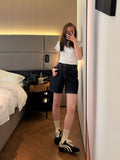 Raw indigo denim shorts mirror outfit shot side