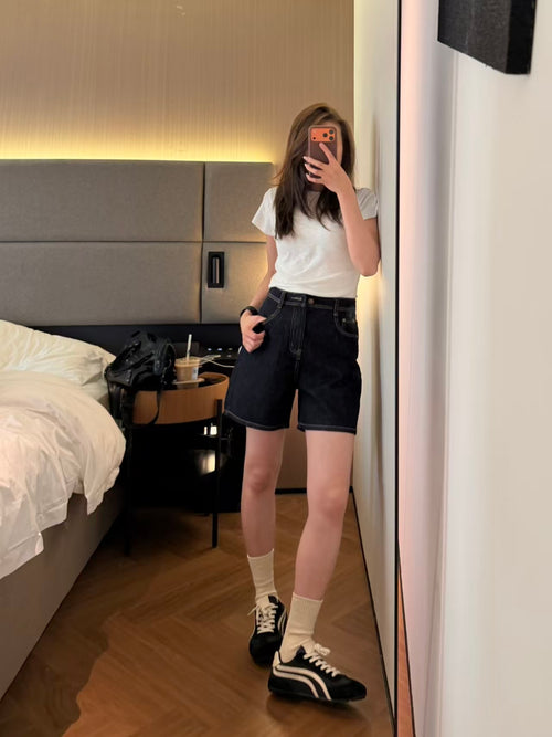 Raw indigo denim shorts mirror outfit shot side