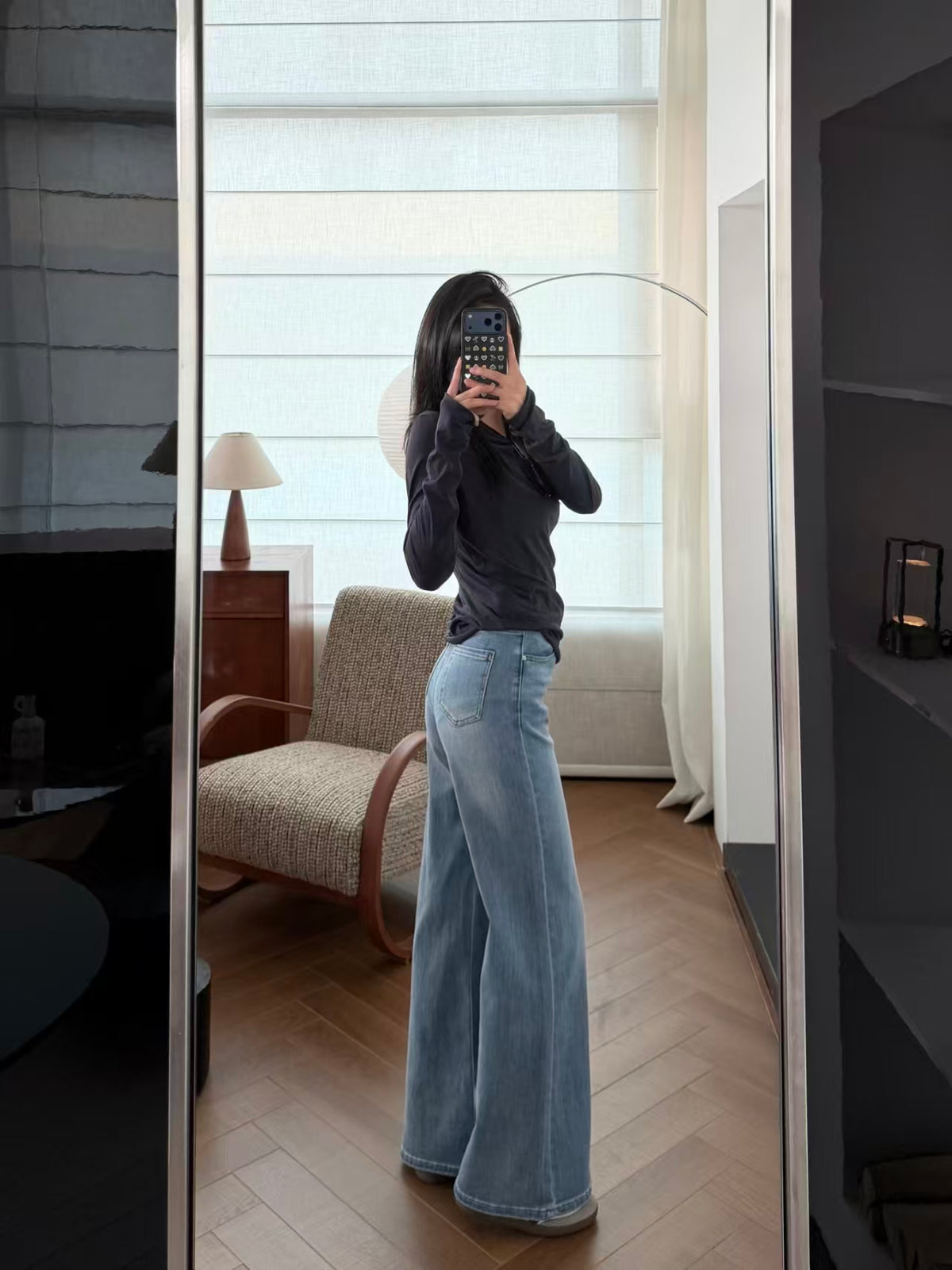 Light blue wide-leg flare jeans – full body mirror shot