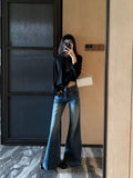 Low Rise Textured Flare Jeans - front waist detail