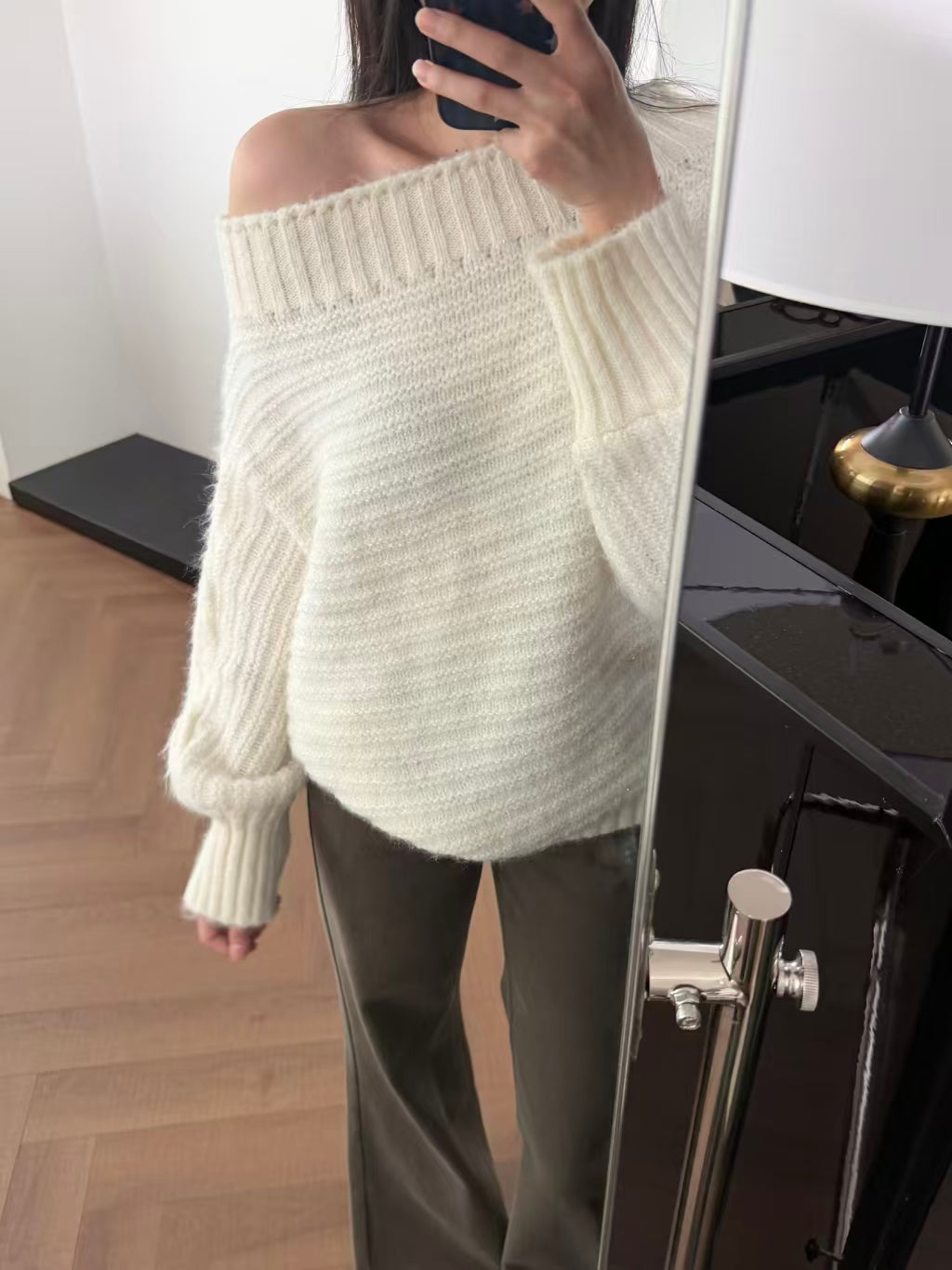 Full-length side mirror shot showing silhouette and drape