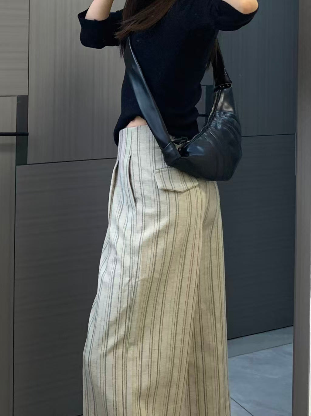 Waist and pleat close-up detail