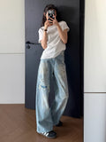 Distressed Paint Splatter Wide Leg Jeans - back view standing