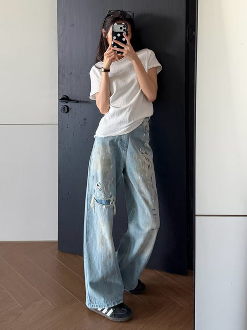 Distressed Paint Splatter Wide Leg Jeans - back view standing