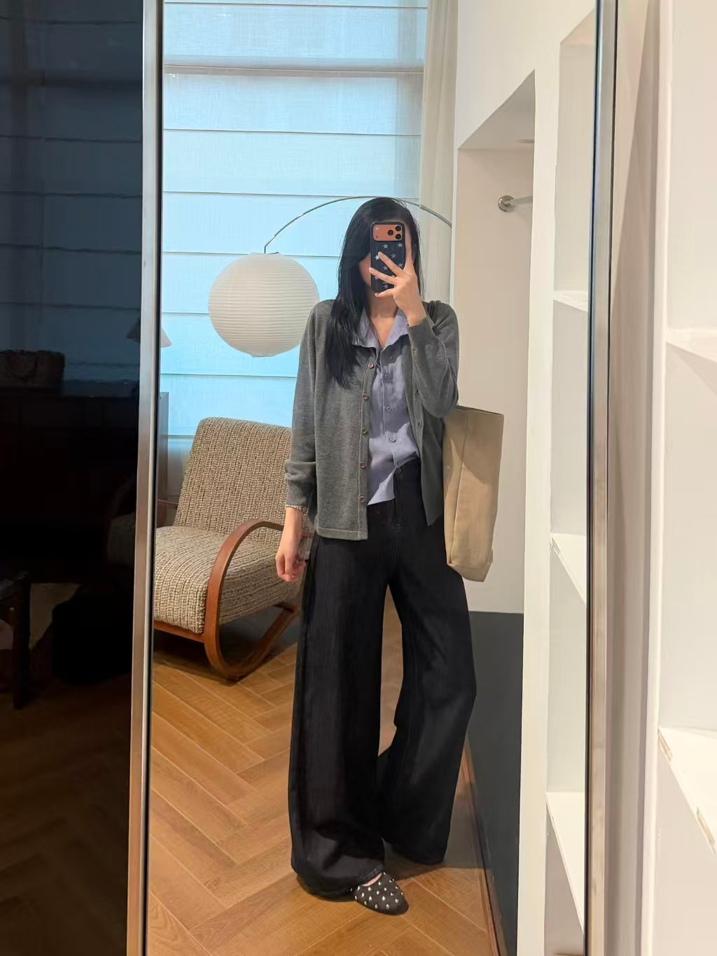 Charcoal grey layered knit cardigan with wide-leg black trousers, front mirror shot