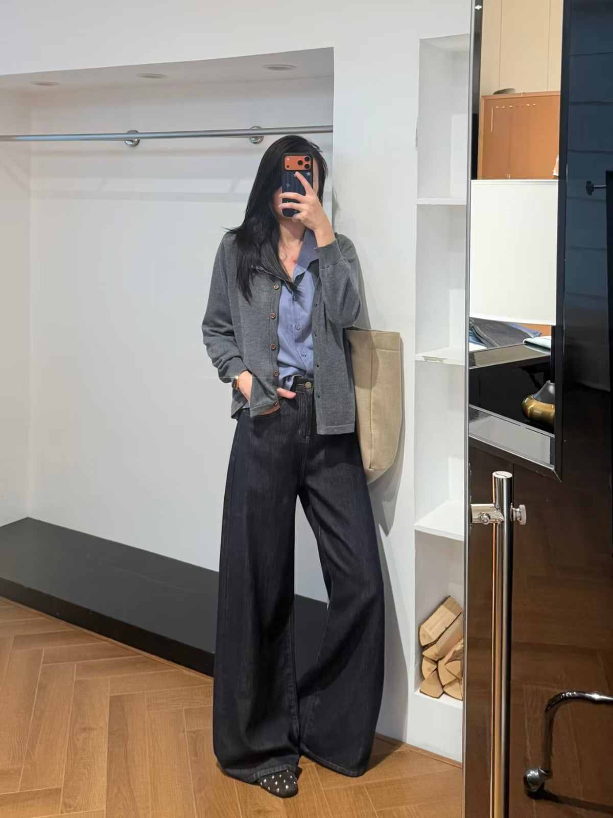 Full-length mirror shot in store fitting room